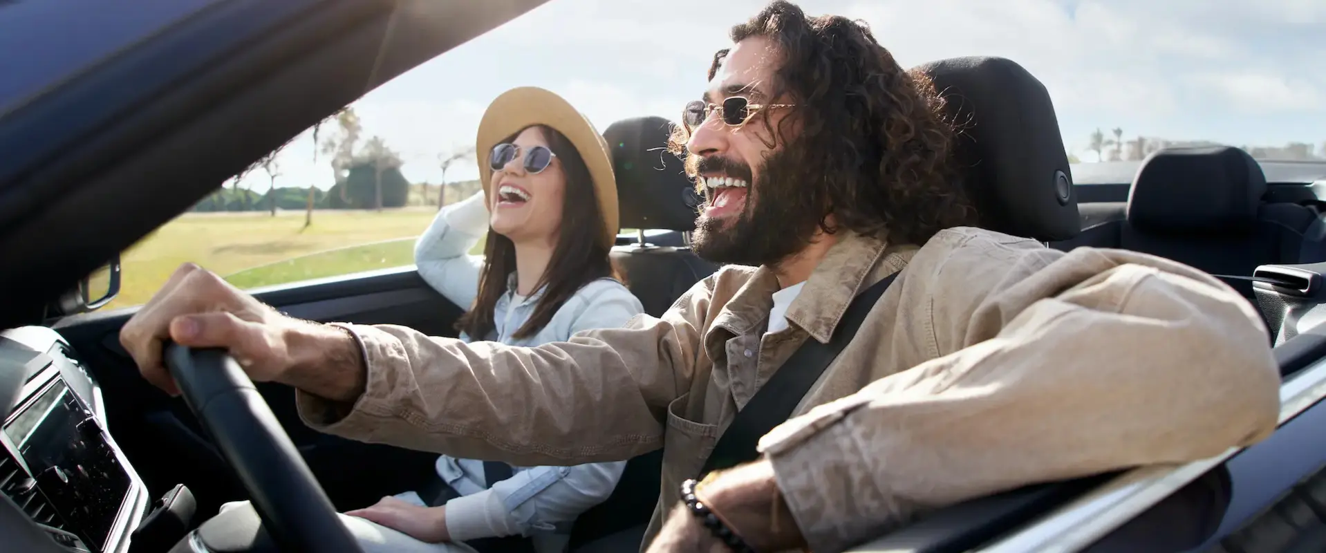 Customer examining a used car interior
