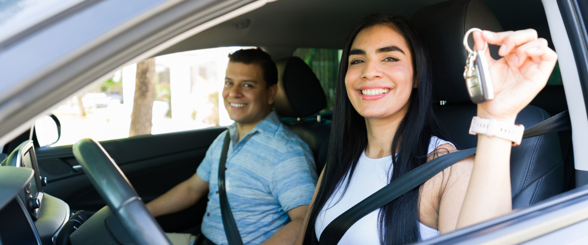 Lady holding keys out the window